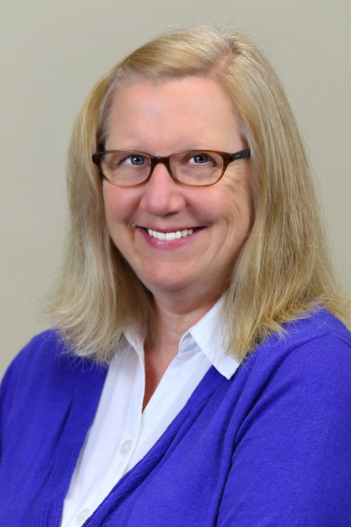 A headshot of Karen Dugdale, WSM.