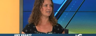 Amy is interviewed on live TV.